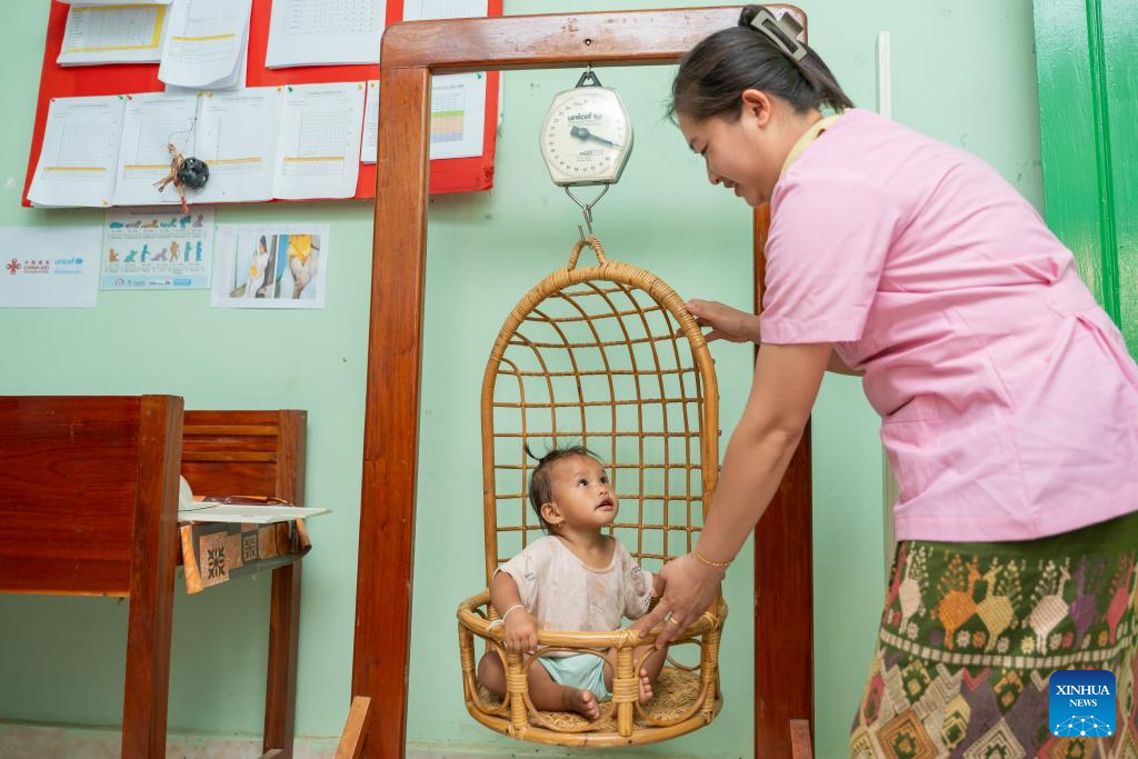Destaque: Onde a esperança brilha como joias -- China e UNICEF ajudam crianças laosianas a combater desnutrição