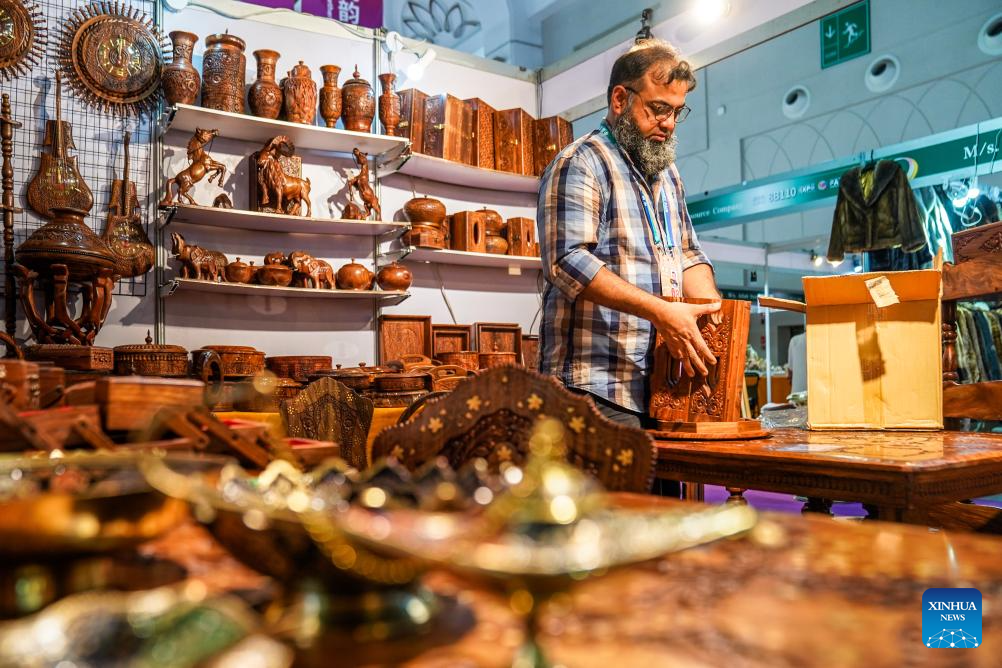 Comerciante paquistanês Saad participa de 10 edições consecutivas da Exposição China-Sul da Ásia