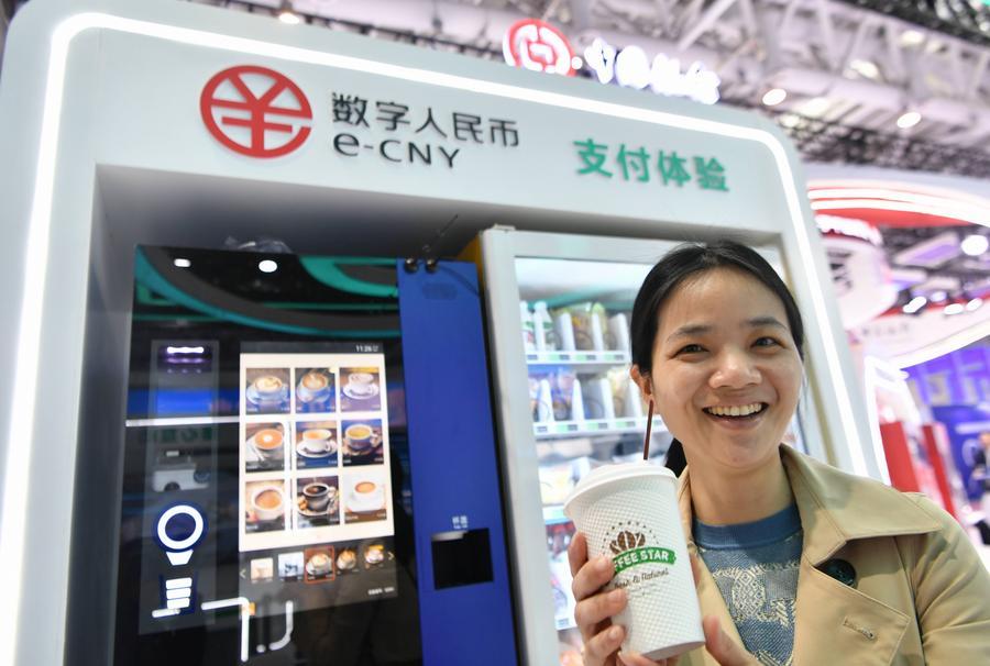 (Multimídia) 26 instituições financeiras aderem aos serviços de transferência transfronteiriça do e-CNY